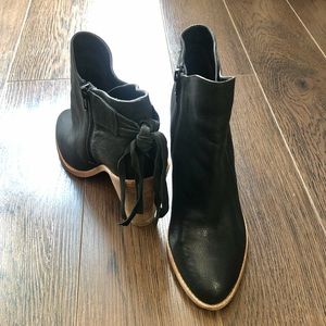 Vince Camuto black leather booties with tassels